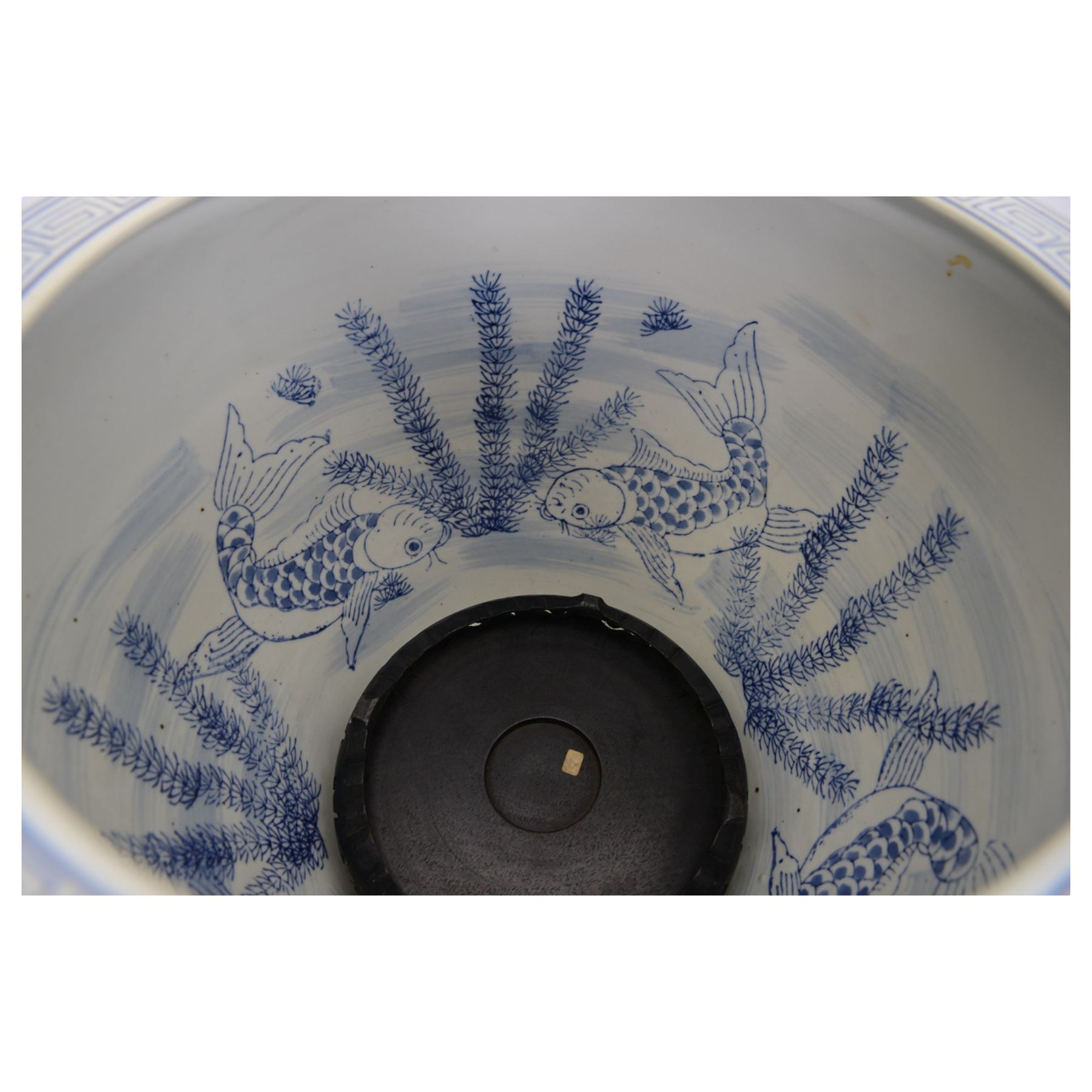 20th century Chinese blue and white fish bowl, the exterior decorated with trailing foliage and ruyi border, the interior with carp swimming amongst reeds, H31cm x D37cm, together with a Chinese blue and white table lamp and shade, of lobed ovoid form, H73cm overall 