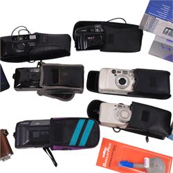 Collection of compact cameras, including Yashica, Minolta and Praktica examples, Boots binoculars, two Pentacon lenses and other accessories