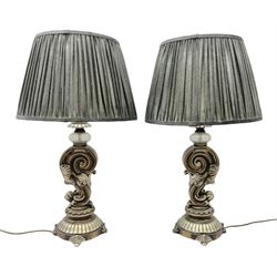 Pair of modern large table lamps, the ornate brushed bronzed and silvered bases raised upon circular spreading foot with four shell feet, with fabric shades, H74cm