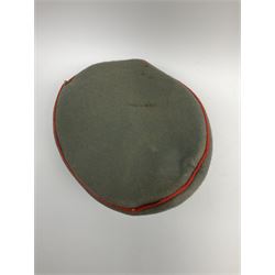 WW2 German Army Artillery officer's peaked cap, red piping to the crown and bordering the central band, zinc eagle and aluminium cockade insignia, officer's bullion chin cords, interior retains original sweatband and lining has tailor's celluloid diamond with 'Extra Klasse' logo and 'Marke Standard'