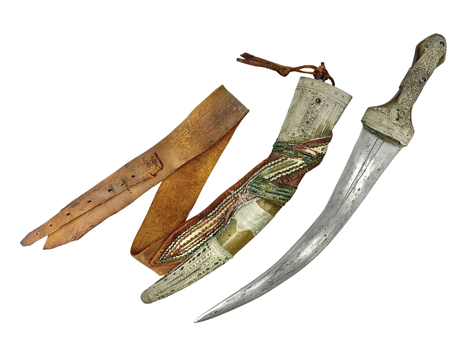 Saudi Arabian khanjar dagger with 29.5cm curving double edged  steel blade; white metal and copper mounted horn grip; in white metal mounted brass and leather scabbard incorporating embroidered leather wearing strap