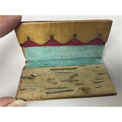 Six sewing related Mauchline ware comprising an oval reel box with internal label for Clark & Co's, tape measure, pin case and three thimble holders of ovoid form 