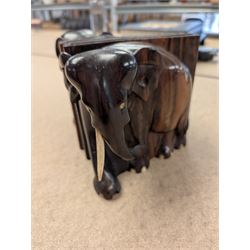 Pair of carved elephant bookends with bone tusks, H14.5cm