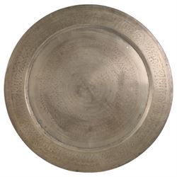 Large Eastern brass charger with floral and foliate engraved decoration, D70cm