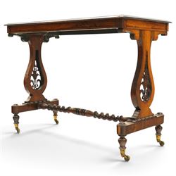 Victorian walnut marquetry and parquetry centre table, the rectangular top with floral marquetry and geometric lattice parquetry with ebonised moulded edge, raised on lyre-shaped end supports with pierced floral scrollwork, united by a spiral-turned stretcher, on brass castors