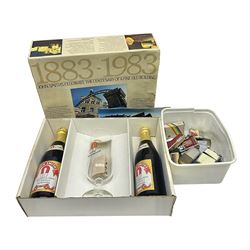 John Smiths presentation box commemorating 100 years of the Tadcaster brewery, containing two bottles of special brew and a glass, and a collection of lighters including Ronson and Jutson