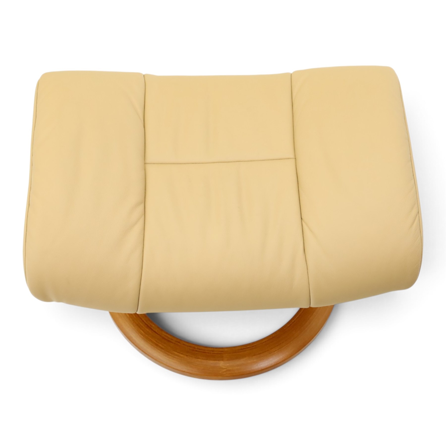 Ekornes Stressless - beech framed reclining swivel armchair with matching footstool, on U-shaped supports with circular bases, upholstered in beige leather