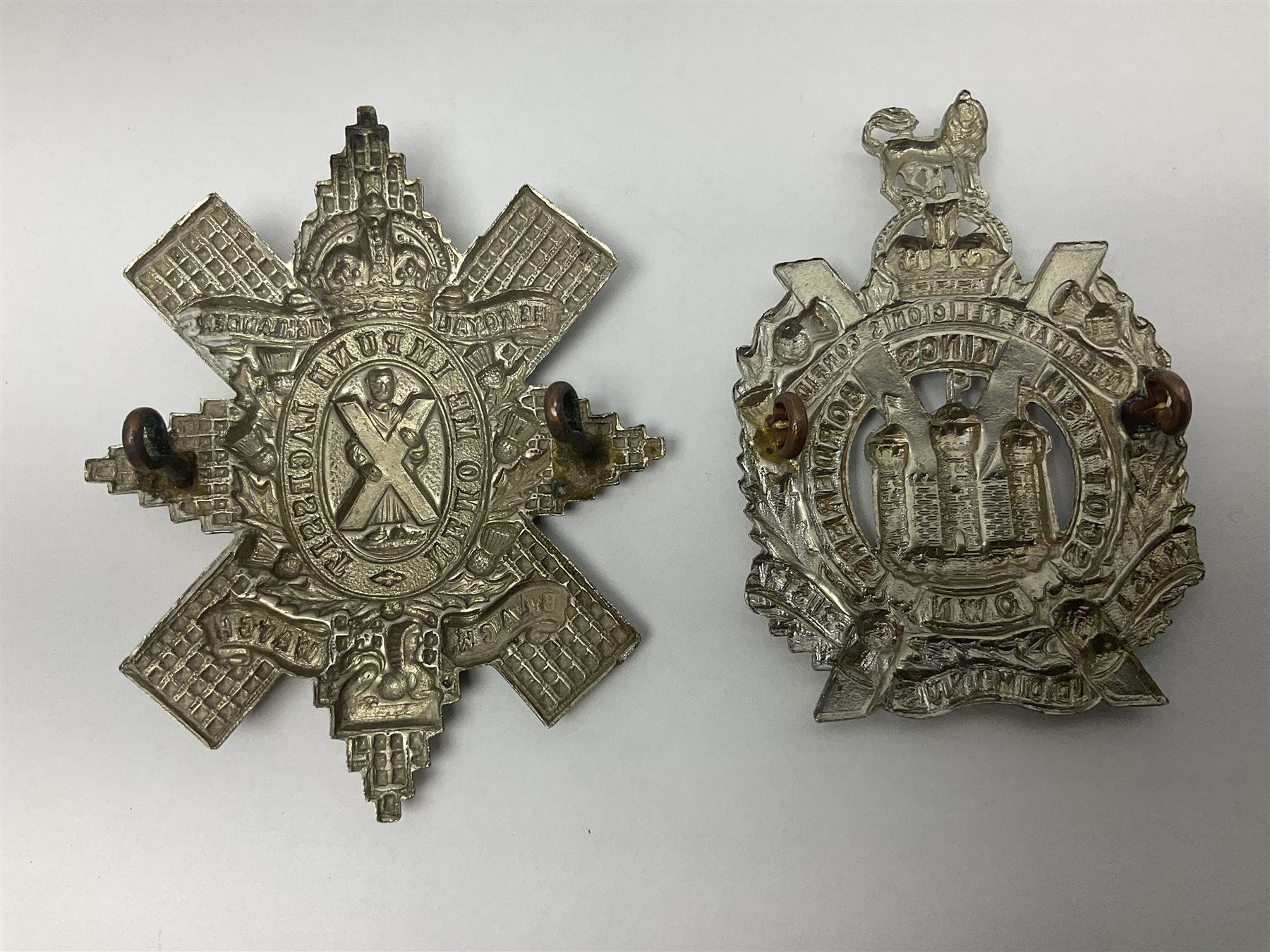 Thirteen Scottish metal Glengarry badges including Black Watch, Highland Regiment, Cameronians, Argyll & Sutherland, Seaforth Highlanders, Kings Scottish Own Borderers etc