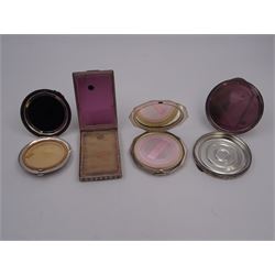 Four silver mounted compact mirrors, including an Art Deco example, with engine turned decoration and blank cartouche to cover, hallmarked Crisford & Norris Ltd, Birmingham 1935,and a continental example, engraved with scrolling foliate decoration, stamped made in Italy 800, etc, each with interior mirrors and powder fittings