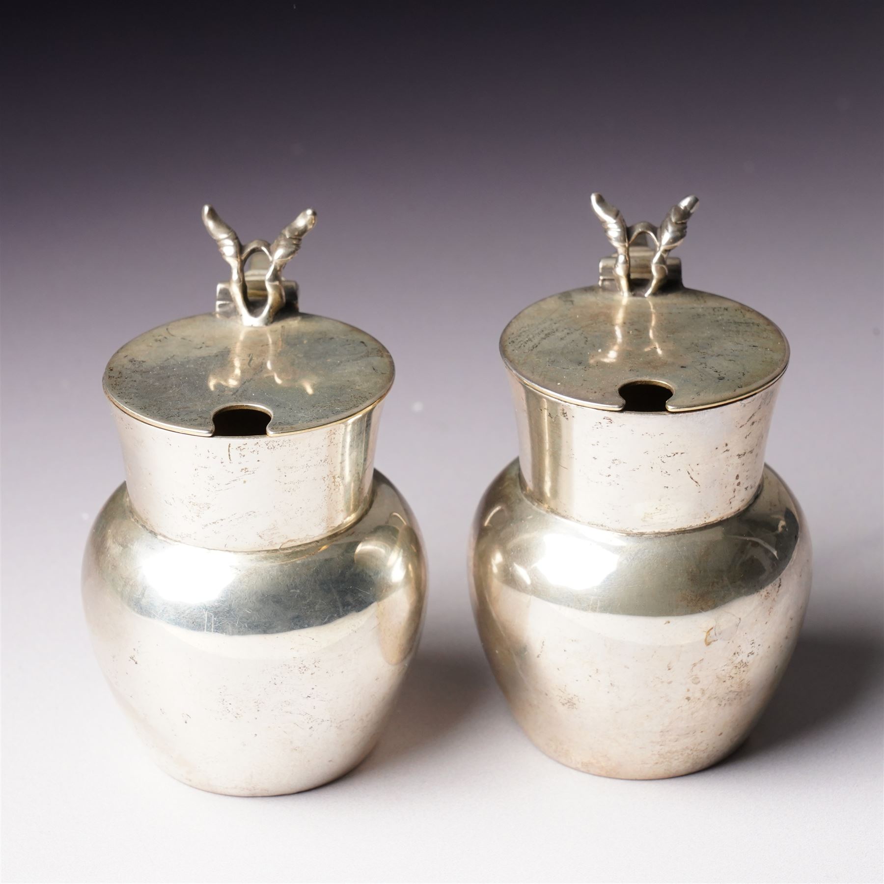 Pair of late Victorian small silver mustard or preserve pots with gilded interiors of baluster form H6cm London 1899 Maker Stokes & Ireland Ltd (2)