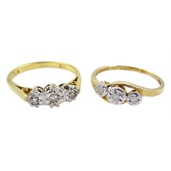 18ct gold illusion set three stone diamond ring and a 9ct gold crossover ring, both hallmarked