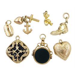 Gold bloodstone swivel fob pendant, Chester 1918, later gold bloodstone pendant, four gold charms/pendants including boot, Lincoln imp, coffee bean and heart, all 9ct  