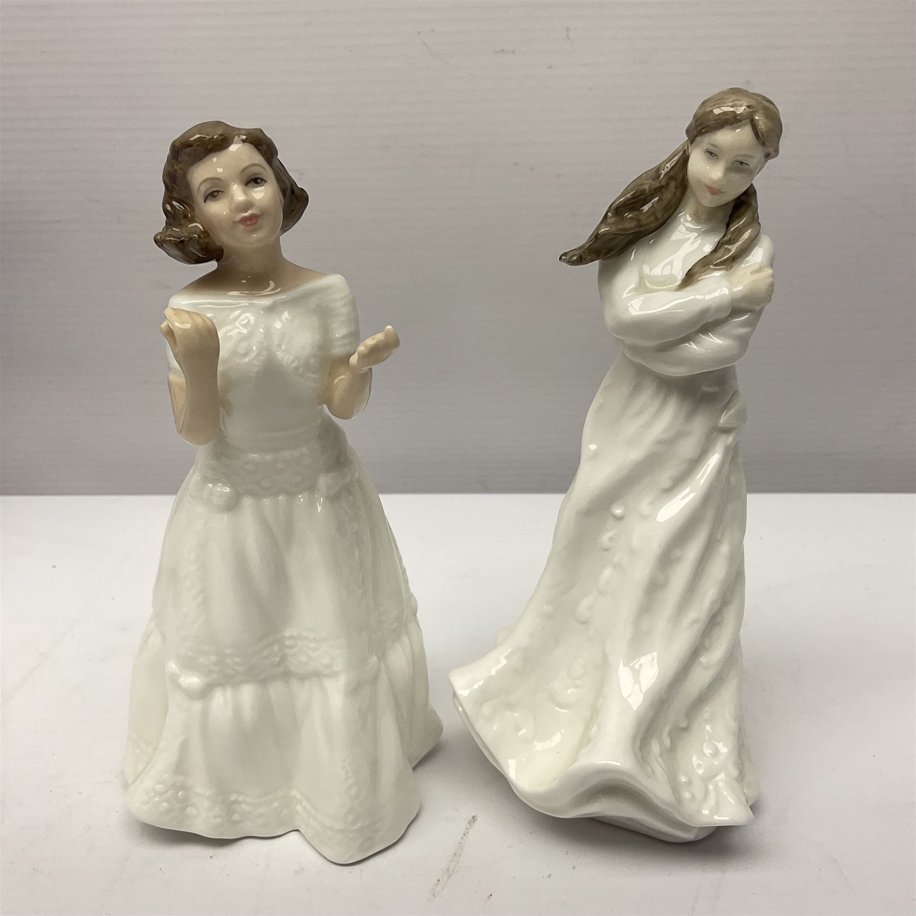 Seven Royal Doulton figures, comprising Sara HN2265, Lorraine HN4301, Mary HN3375, Olivia HN5114, Charlotte HN4092, Josephine HN4223 and Rachel HN4780, together with five smaller Royal Doulton figures (12)