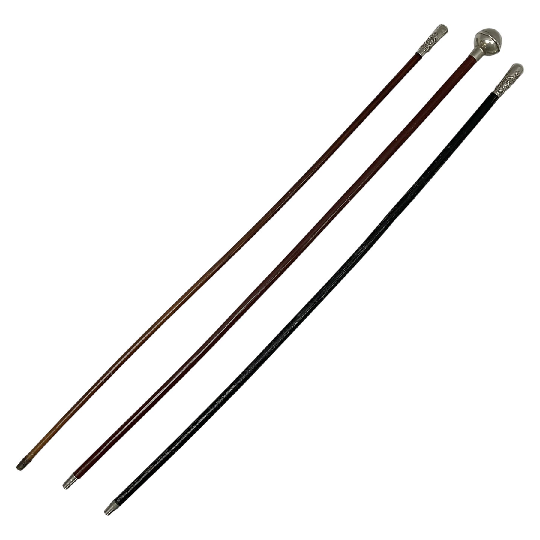 Three military swagger sticks - 14th Foot West Riding POWO Regiment; Northern Cyclist Battalion; both with regimental crests; and another with spherical terminal inscribed L/Cpl. Boycott P.M. WC. C.C.F. 7th Dec. 1960 (Combined Cadet Force?); all with plated mounts (3)