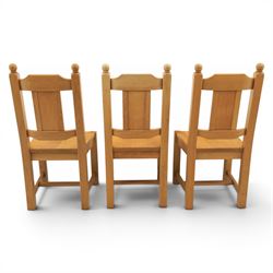 Contemporary solid oak dining table, and set of eight chairs, rectangular plank top with chamfered edges, raised on square supports
