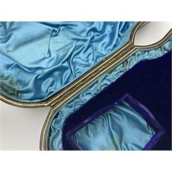 Victorian three-piece silver tea service, comprising teapot, twin handled open sucrier and milk jug, of oval form with shaped rim and C handles, each engraved with crests and bands of strapwork decoration, the milk jug and sucrier with gilt interiors, hallmarked Josiah Williams & Co, Exeter 1881, the teapot with ivory insulators and finial, all contained with a tooled leather, blue silk and velvet lined fitted case, retailed by West & Sun, Dublin 
This item has been registered for sale under Section 10 of the APHA Ivory Act