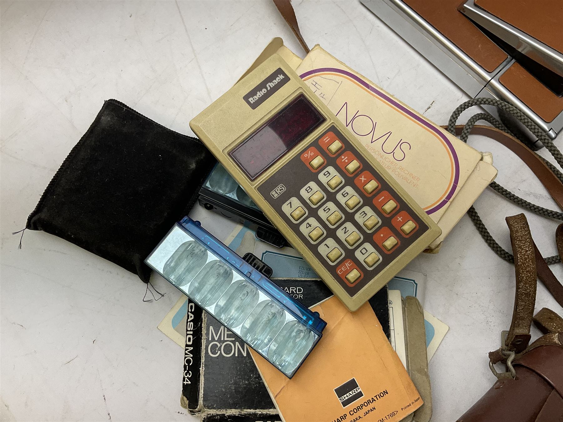 Minolta SRT101 camera, together with Halina camera, Fujifilm DX-8, Canon digital IXUS 1001S and other cameras and accessories 