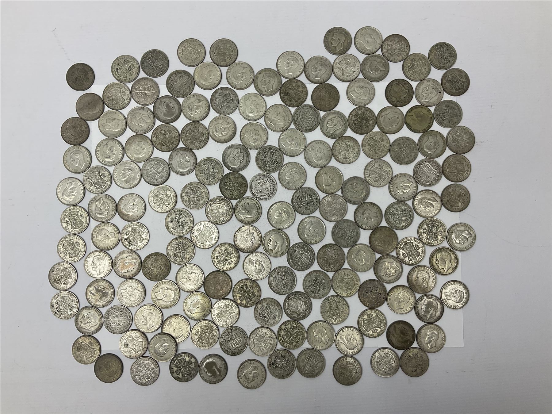 Approximately 2200 grams of Great British pre 1947 silver half crown coins, including King George V and King George VI 