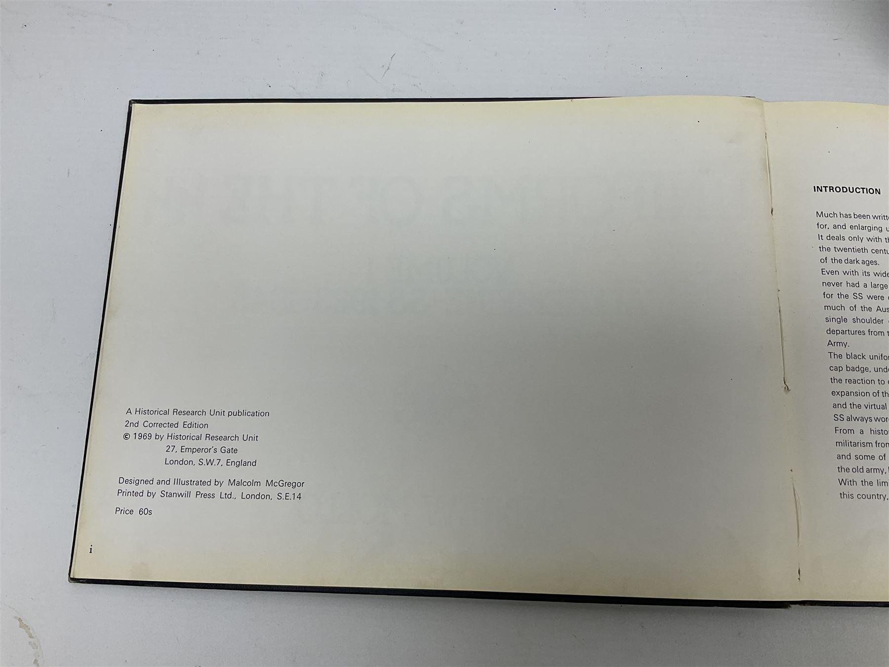 Military Collectors Service: set of three books on WWII German uniforms and badges; and Mollo Andrew: Uniforms of the SS. Volumes 1,4,5,6 & 7 (8)