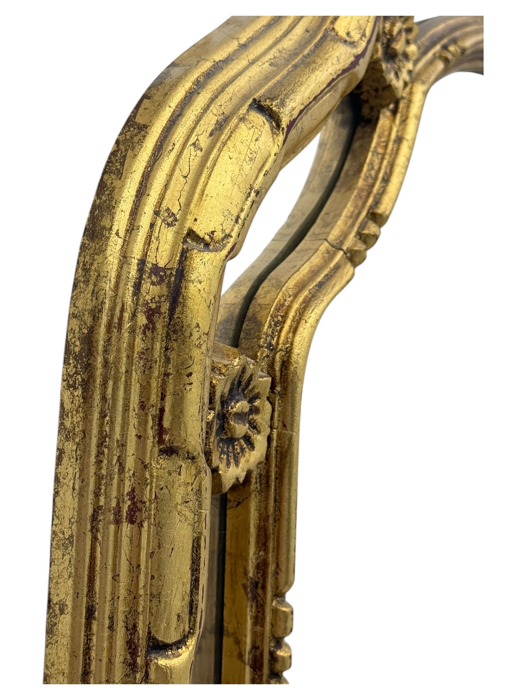 Belgian gilt framed wall mirror, bevelled plate set in mirrored border