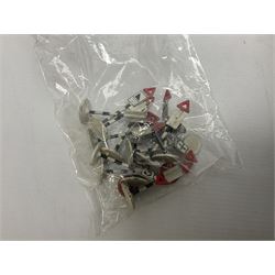 Dinky - over thirty unboxed and playworn die-cast models including Vega Major Luxury Coach, Peugeot 404, Humber Hawk, Ford Transit Van, Jaguar Type D etc; fourteen Dinky road signs; and quantity of other models including Budgie Supercar, Tri-ang Spot-On, Tekno etc