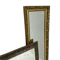 Narrow rectangular wall mirror in ornate gilt frame (42cm x 133cm), and two other wall mirrors