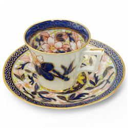 English porcelain Imari tea and coffee wares, pattern 1277, decorated with central orange floral motif surrounded by sprigs of yellow foliage within blue borders, comprising eleven teacups, eight coffee cups, twelve saucers, two shallow bowls and one finger bowl
