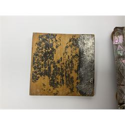 Victorian mother of pearl tea caddy, of rectangular bow-fronted form, the body with floral, bird and geometric engraved mother of pearl panels, white metal shield plaque to the cover inscribed with the initials G.J.A and similar escutcheon, the two division interior with ivory edging and two panelled mother of pearl lids, on four vegetable ivory bun feet L20cm, together with a similar style mother of pearl card case (2) This item has been registered for sale under Section 10 of the APHA Ivory Act