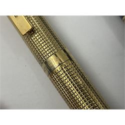 Sheaffer Targa 1011 Diamond Square fountain pen, the gold plated barrel with nib stamped 14K 585, together with another Sheaffer Targa fountain pen with blue barrel and gold nib stamped 14K 585 and matching ballpoint, and Sheaffer ballpoint pen with sterling silver barrel, largest L13.5cm (4)