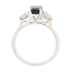 Platinum green tourmaline and diamond three stone ring, single octagonal cut tourmaline of 1.54 carat, with a single round brilliant cut diamond set either side, stamped Plat 950, total diamond weight 1.06 carat
