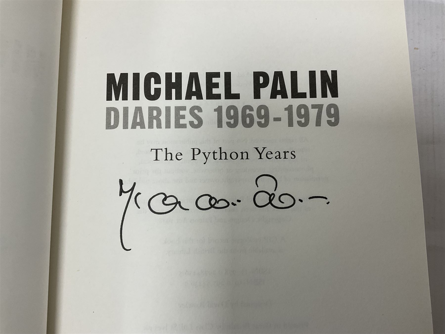 Signed books and ephemera, including Michael Palin Diaries 1969-1979, The Sparks Brothers, Hugh Laurie The Gun Slinger etc 