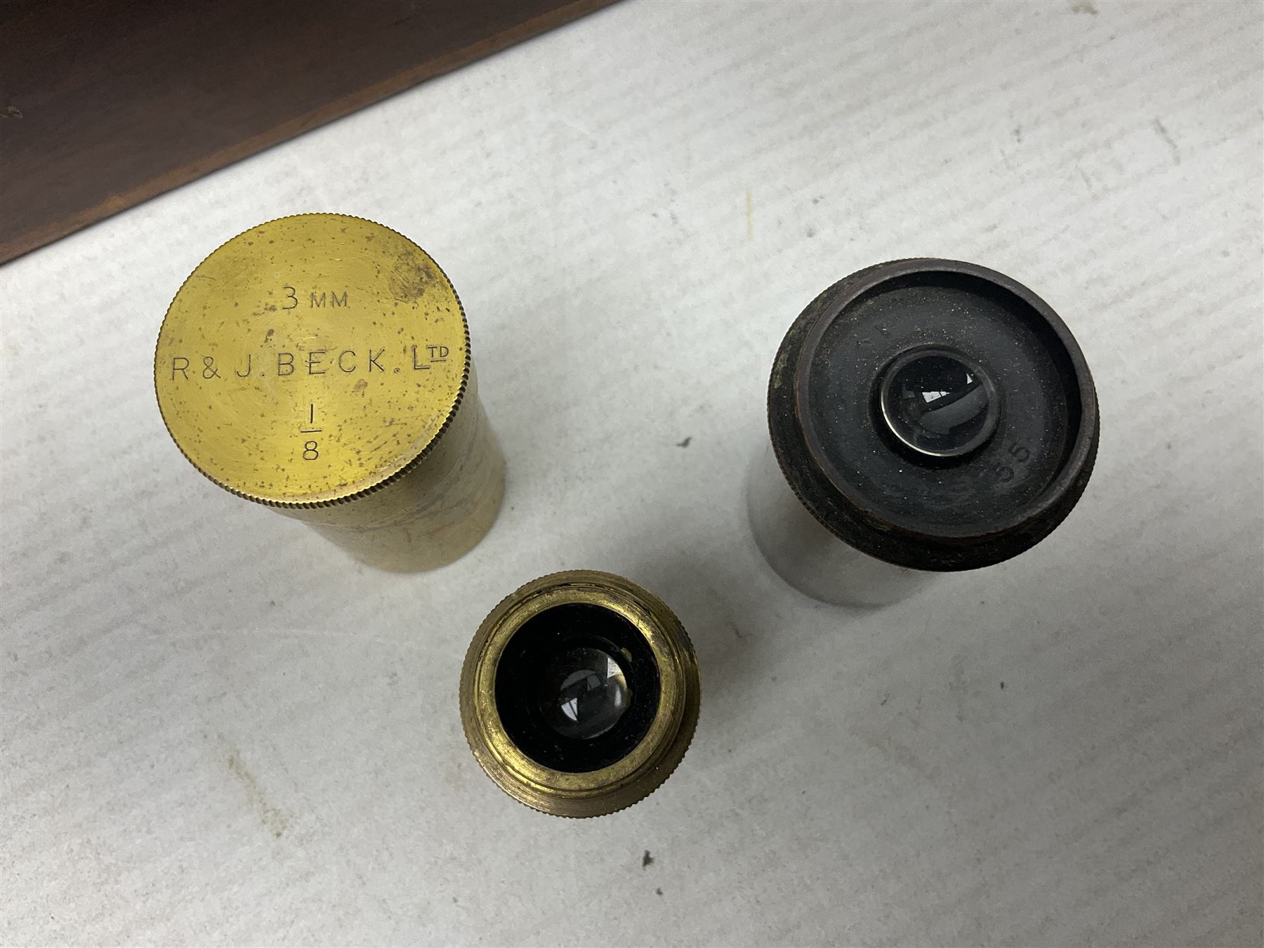 19th century brass monocular microscope by R. & J. Beck London No.18760 with hinged column and pitchfork base H25cm; in fitted mahogany case with two lenses