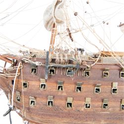 Wooden scale model of HMS Victory, upon a wooden stand with name plaque, H72cm L92cm