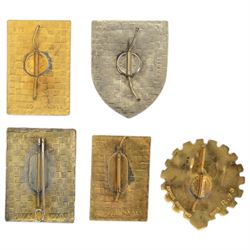 Five French Foreign Legion Kepi Blanc insignia, all marked Drago Paris to the reverse