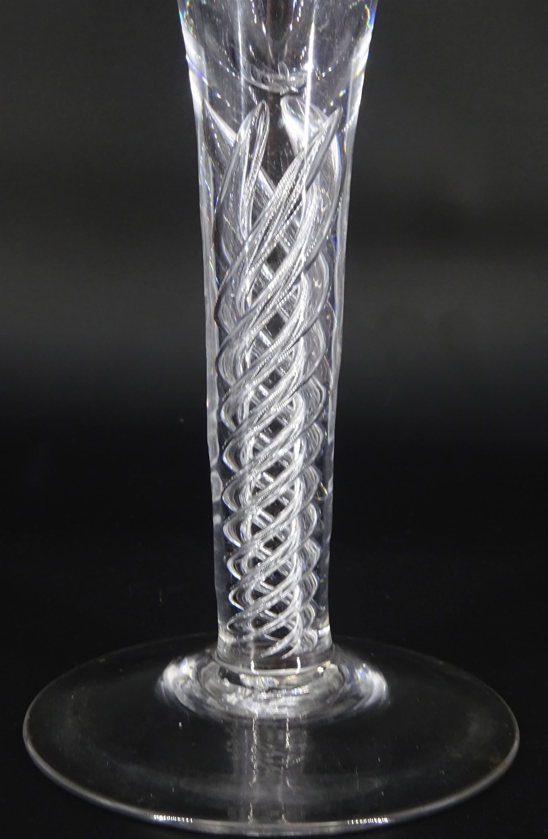 Large 19th century wine glass, the drawn trumpet bowl engraved with fruiting vine, upon single series mercury twist stem and conical foot, H25cm 