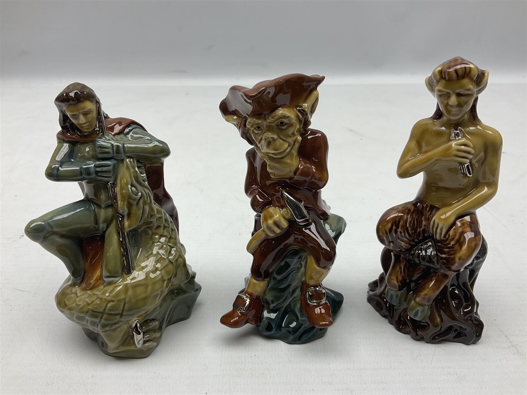 Nine Wade Collectables figures, comprising six Myths and Legends; King Canute, Mermaid, St George, Cornish Tin Mine Pixie, Puck and Green man, together with Lamb, Elephant and bear, a Wade Panda money box and two boxes of Wade Christmas Crackers