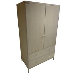 Ercol - 'Salina' wardrobe enclosed by two doors, fitted with two long drawers