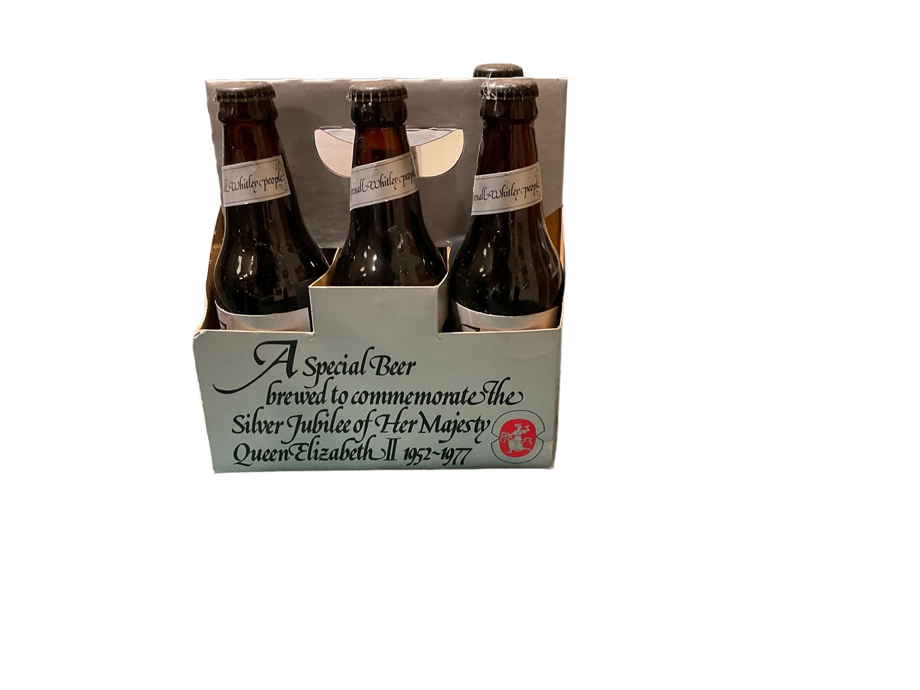 Collection of bottled beers from Greenall Whitley Brewery, including Jubilee beers, Lord Daresbury's 80th birthday ales and The Last post  