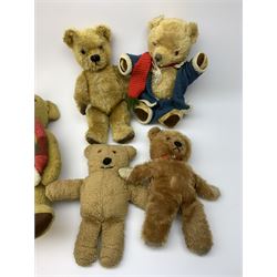 Seven English teddy bears 1950s-60s including Pedigree bear with swivel jointed head, plastic eyes and vertically stitched nose and mouth and jointed limbs with velvet paw pads H15