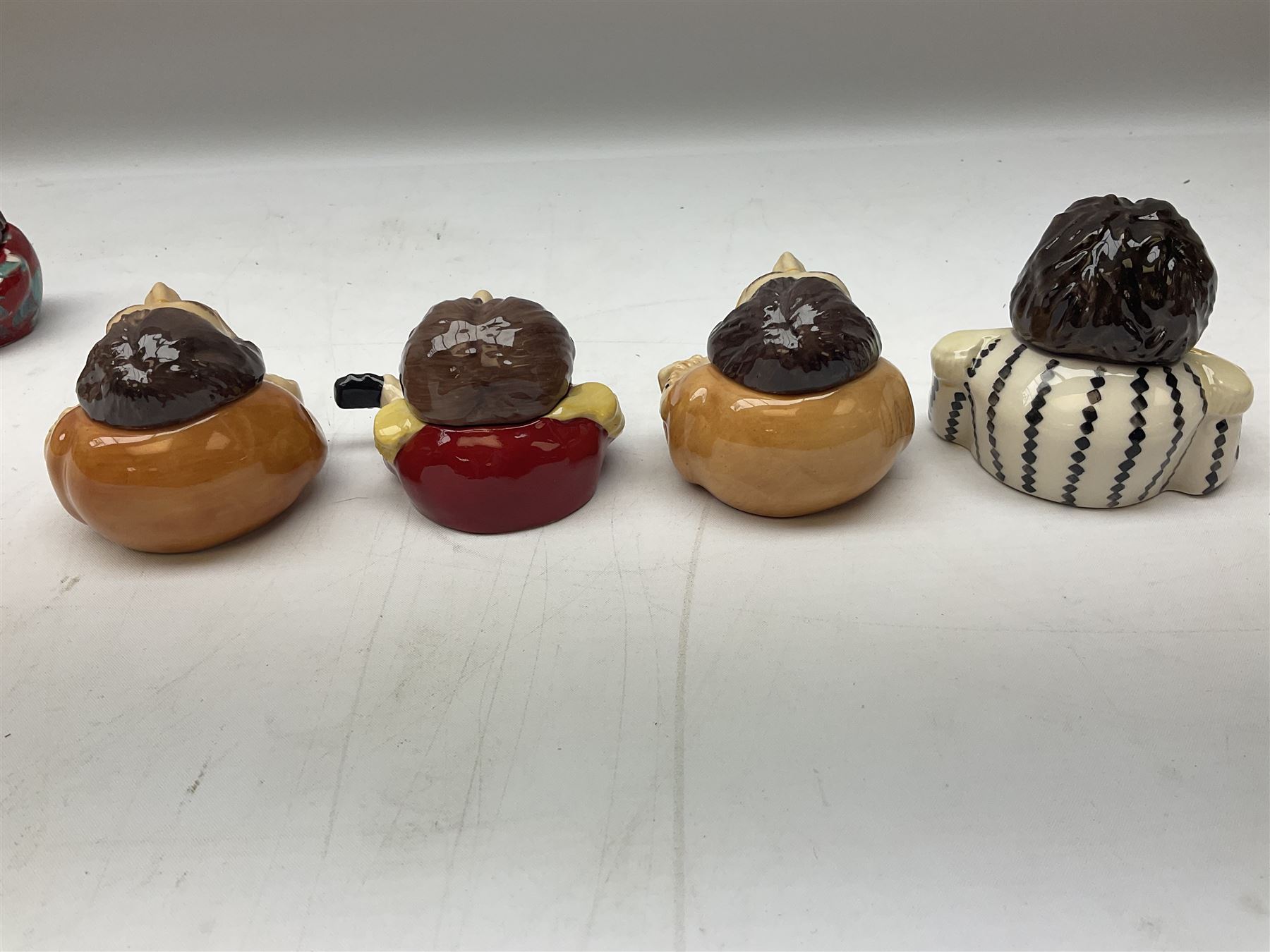 Fifteen Face Pots by Kevin Frances, all of music interest, to include the Beatles; Paul 'Kookoocachu', 'Love Is All You Need', 'Octopus's garden', 'While My Guitar Gently Weeps', 'All You Need Is Love' and 'Everybody's talking and no one says a word', Elton John; I'm still standing, Buddy Holly; 'That will be the day', David Bowie 'We can be heroes' , Mick Jagger prototype colour type etc, all boxed  