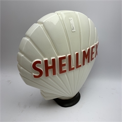 Shellmex glass petrol pump globe by Hailware, of shell shaped form with red lettering H44cm