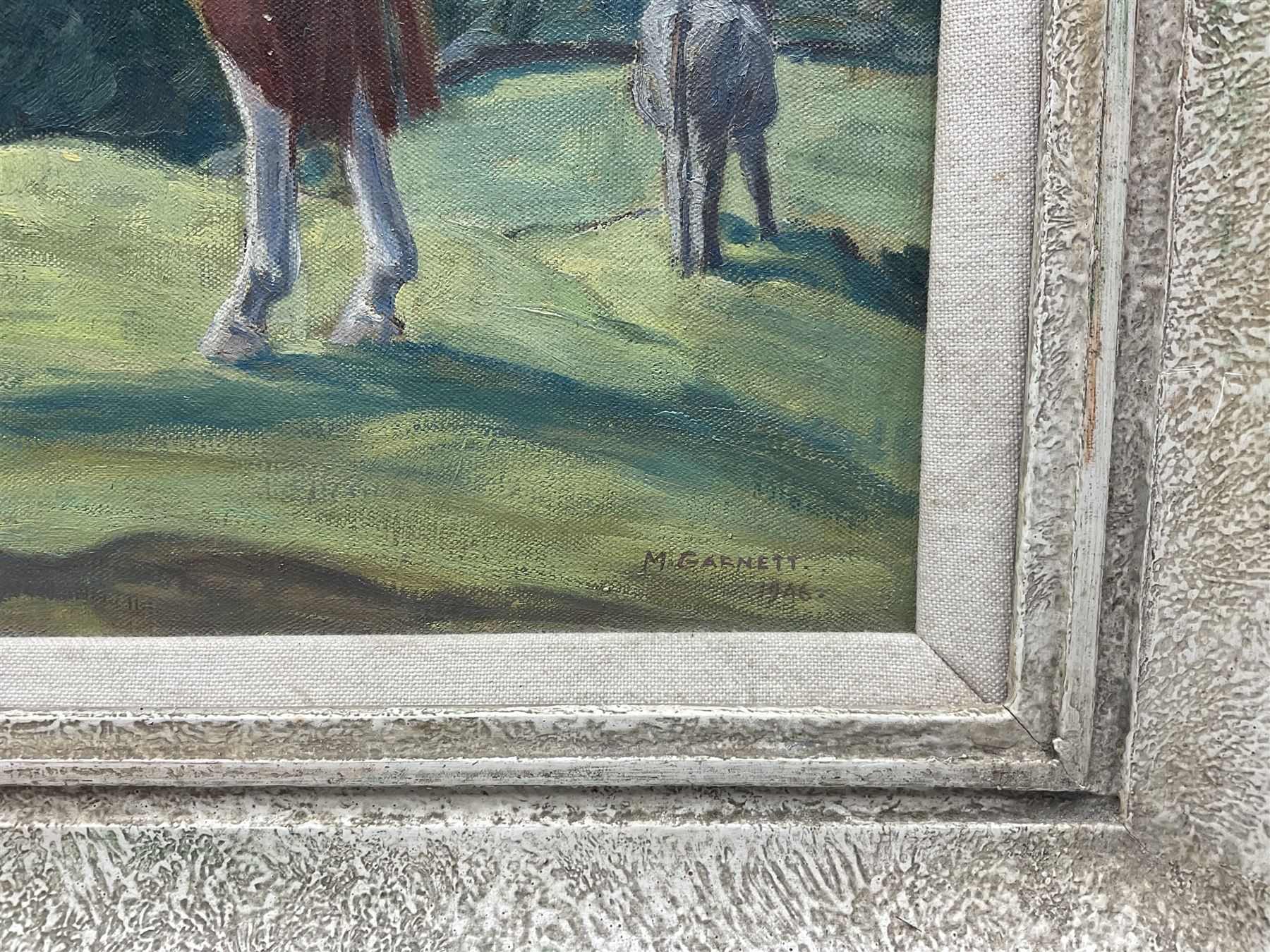 M Garnett (British 20th Century): Grazing Horses ''Ptarmigan' At Grass', oil on canvas signed and dated 1946, titled verso 29cm x 37cm 