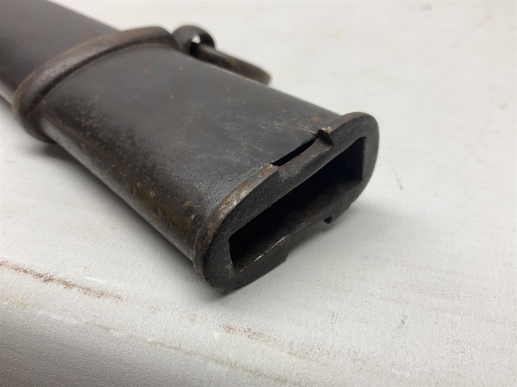 Italian M1833 Sabre with slightly curving 79cm fullered steel blade, the plain steel hilt with 'D' shaped knuckle bow, langets and wire-bound leather grip; in steel scabbard with single hanging ring L101cm overall