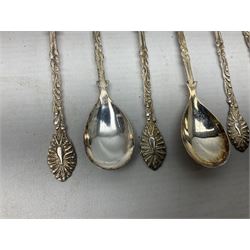 Set of four Continental silver spoons and forks, with stylised terminals, a number stamped S800, approximate weight 88.4 grams