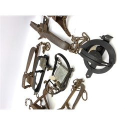 Eleven gin and animal traps including Fenn Mark 1 rabbit trap, 'The Imbra Trap', hawk trap with flat jaws, mole traps etc. Auctioneer's Note: These traps are sold as artefacts for ornamental purposes only as the use of some of them is illegal.