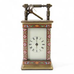 Late 20th century- Chinese 8-day timepiece carriage clock with Cloisonne work on a red gro...