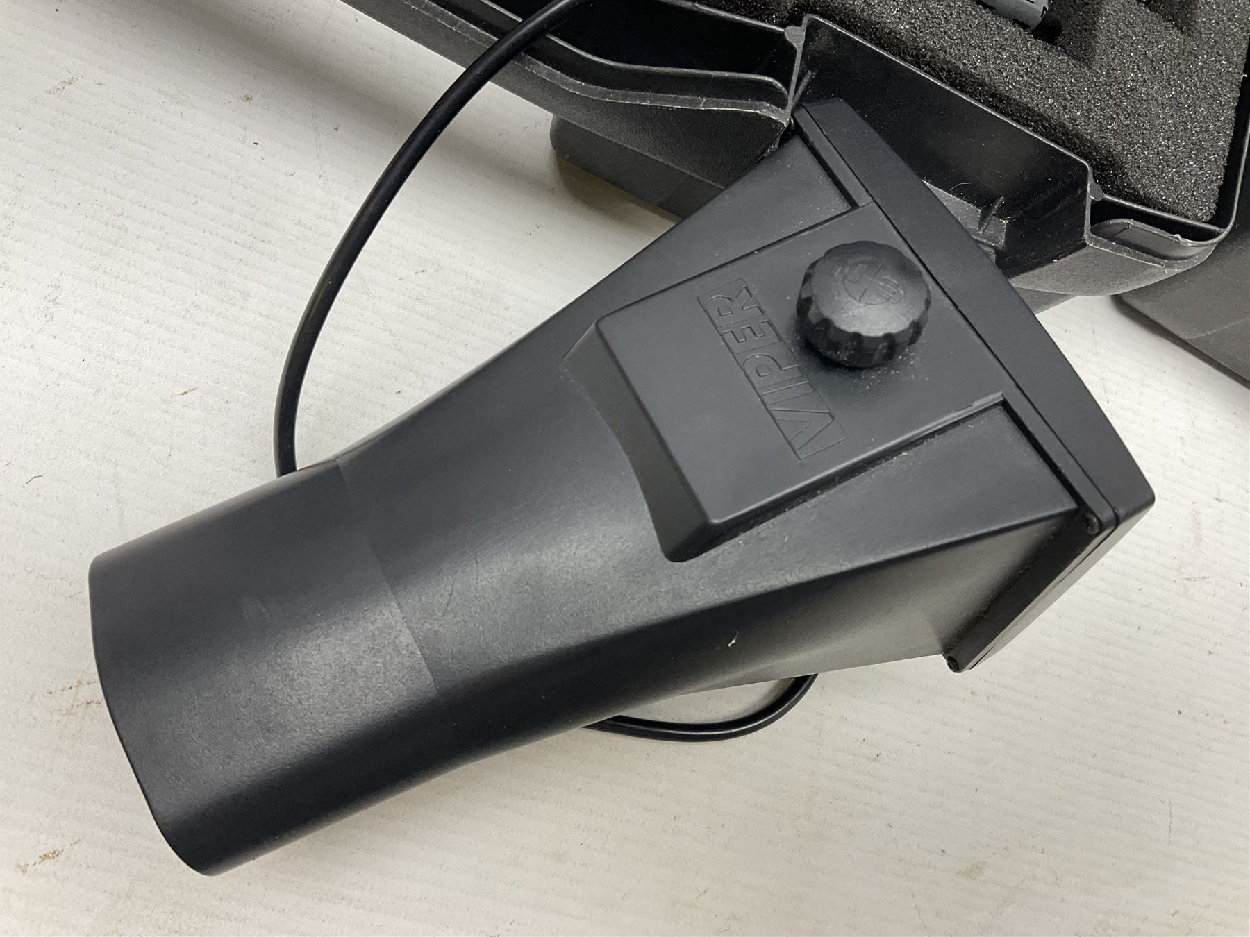 Two Nite-Site add-on kits in hard plastic carrying cases; one with charger