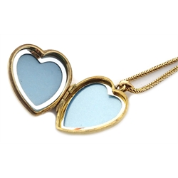 Gold heart shaped locket on gold chain hallmarked 9ct