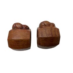 Mouseman - pair of oak napkin rings, of bulbous octagonal form each carved with mouse signature, by the workshop of Robert Thompson, Kilburn, L4cm W6cm
