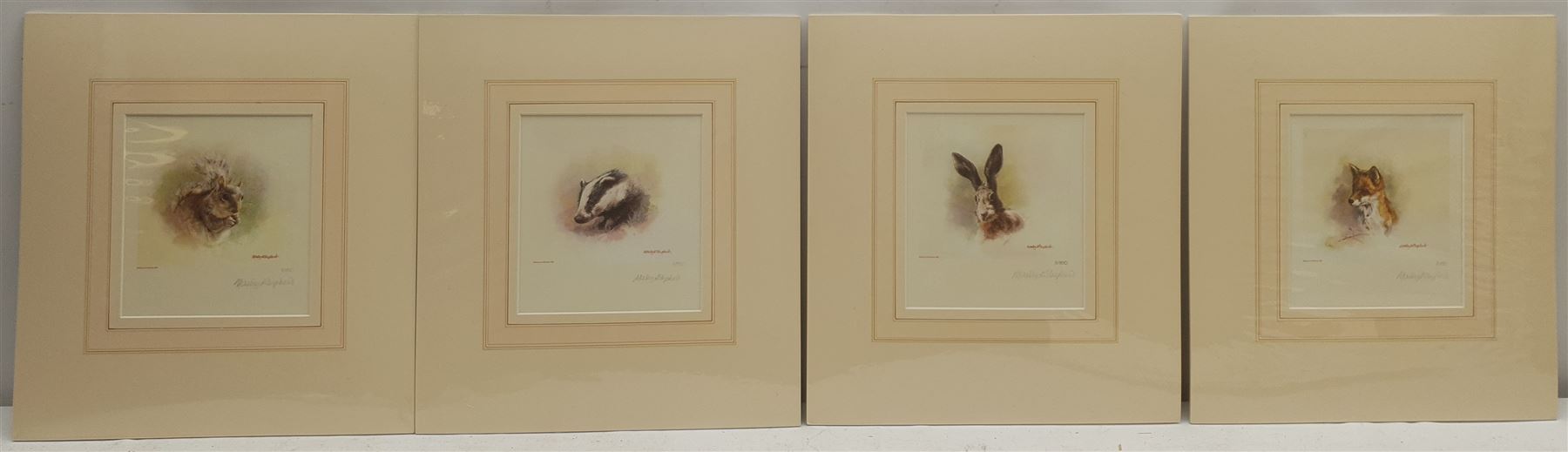 David Shepherd (British 1931-2017): 'Black Rhino', 'Haggis of Battersea', 'Dormouse' and 'Happy Hippo', four limited edition prints signed and numbered in pencil, max 16cm x 16cm (unframed); Mandy Shepherd (British 1960-): Wild Animals, set four limited edition prints signed and numbered in pencil 11cm x 12cm (mounted) (8)